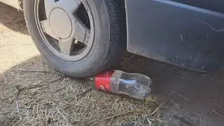 EXPLODING A COLA BOTTLE WITH A CAR TIRE
