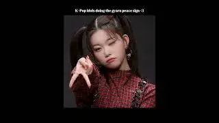 kpop idols doing the gyaru peace sign
