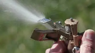 Adjusting and Maintaining a Rain Bird Riser-Mounted Brass Impact Sprinkler