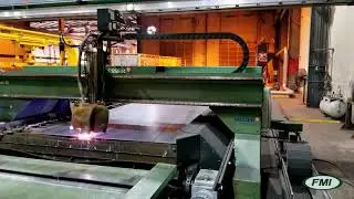 PLASMA WEB CUTTING SYSTEM WITH MOVING SLAT TABLE AND GANTRY LOADING