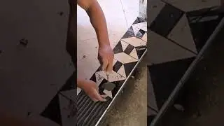 the installation of tile pieces on the floor is very beautiful #construction #tile #floor #shorts