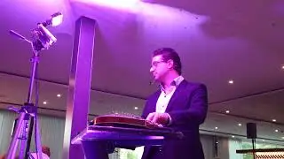 Brilliant zither player, Tomy Temerson, with 