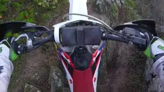 Test on the new Michelin enduro medium tyres on the tight trail just after rain