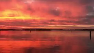 The sun setting over Hickling Broad