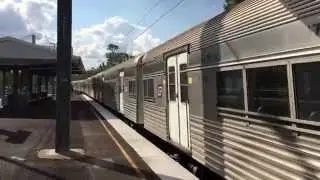 QR Heritage 1620 and SX 45 passing Sherwood station