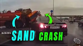 Sand-Laden Truck Loses Control and Crashes Making a Turn