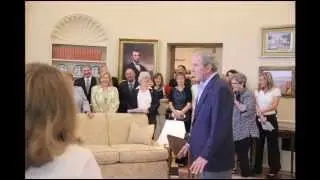 President Bush pays surprise visit to students on first-day tour