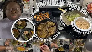 COOK W. TIONA JAI’| THE MOST TENDEREST CURRY PORK CHOPS, GARLIC PARM ASPARAGUS, PLANTAINS & RICE   
