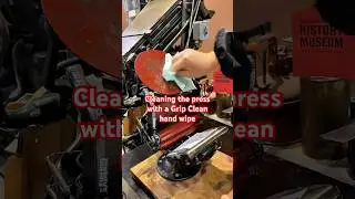 Cleaning a Golding Official No. 2 tabletop printing press with a @GripClean hand wipe