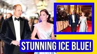 Catherine Radiates Glamour in Ice Blue Satin Gown with Bold V-Neck at Glittering Reception