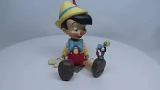 Disney Enesco Traditions Jim Shore ; 6011934 Pinocchio + Jimminy Grille