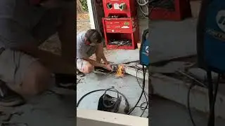 In the shop welding up a trailer jack on an old trailer