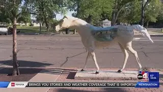 The road leading up to Ogden's pioneer day celebration is lined with horses