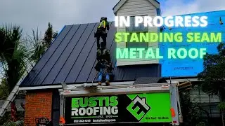In Progress low gloss black metal standing seam roof - Eustis Roofing