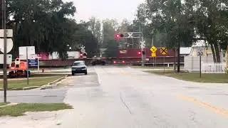 Seaboard Coast Line heritage unit! CSX I138 goes by Folkston, GA