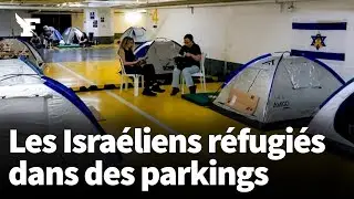 Les images des habitants de Tel-Aviv contraints de se r&eacute;fugier dans des parkings souterrains