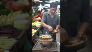 Roasting Sago Worms: Traditional Market Street Food in Asia.@darmawanfood-ai