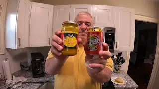 Eating Piccalilli and drinking Tizer for the first time.