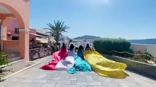 Bougie Blacks Travel | Flying Dress Shoot in Santorini