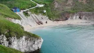 FLAMBOROUGH HEAD BY AIR, WW2 STRUCTURE HIDDEN IN THE CLIFF.