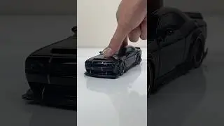 1:24 scale die-cast model car of a black Dodge Challenger SRT Demon #carmodel