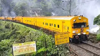 Indian railways RAIL GRINDING MACHINE passing through Dudh Sagar Waterfalls
