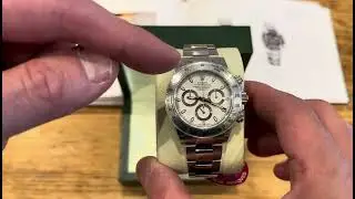 A STICKERED 116520 ROLEX DAYTONA