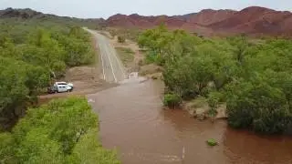 Coongan river flooding over road at Doolena Gorge