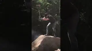 Splitting massive rock in half with a sledgehammer