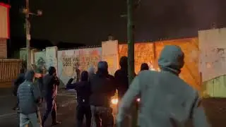 Gates set alight at the peace line between between the Shankill Road and Lanark North Belfast
