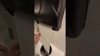 #shorts HORRIBLE sounding San Jamar Automatic Paper Towel Dispenser at Dave & Busters....