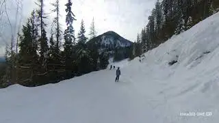 Cutting to Grey Mountain chairlift. Red Mountain.