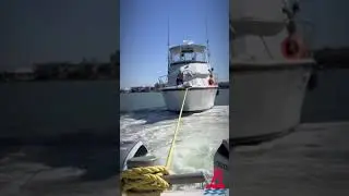 Captain Seth assisting a 42ft Hatteras! #towboatus  #boatus  #oops #towing  #sandbar