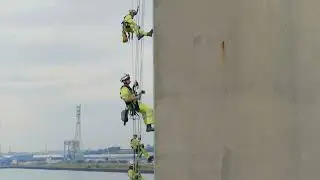 safety inspectors working at height on a concrete 2023 11 27 05 02 16 utc