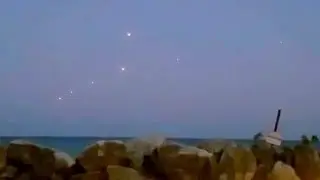 Fleet Of UFOs Filmed Flying In Formation Over Lake Michigan