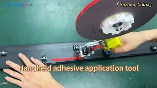 Handheld adhesive application tool