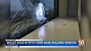 Bullet Hole in Fifth Third Bank Building Window