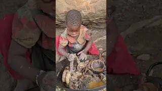 brave little Hadzabe kid piking toughest intestine #reels #cooking #africa #video #trending #chaabaa
