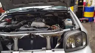 Suzuki Jimny radiator replacement and crank pulley removal.