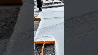 The road snow removal technique uses a manual push shovel.