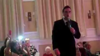 JK AS ROBBIE WILLIAMS 