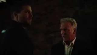 Arrow S05E08 Oliver and his father are saved by The Hood