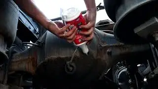 SEMI TRUCK CHECK AND ADD OIL INTO AXLE