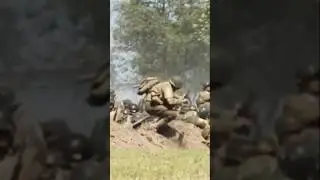 WW D Day American Soldiers on Beach Ready to Storm German Soldiers at WW D-Day Reenactment in Ohio