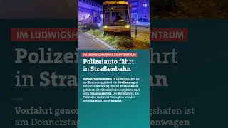 Polizeiauto f&auml;hrt in Stra&szlig;enbahn im Ludwigshafener Stadtzentrum