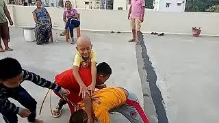 Corona Lockdown/ children time pass kabbadi game/ terrace, Fun/ Evening/ 2020
