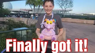 He got his EPCOT Figment popcorn bucket!
