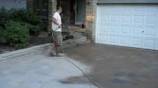 Polymeric sand installation for interlock stone driveway costruction