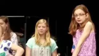 Children singing at CLI Church
