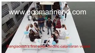 Solar electric catamaran ship vessel made in Bangladesh. Green, pollution free river transport.